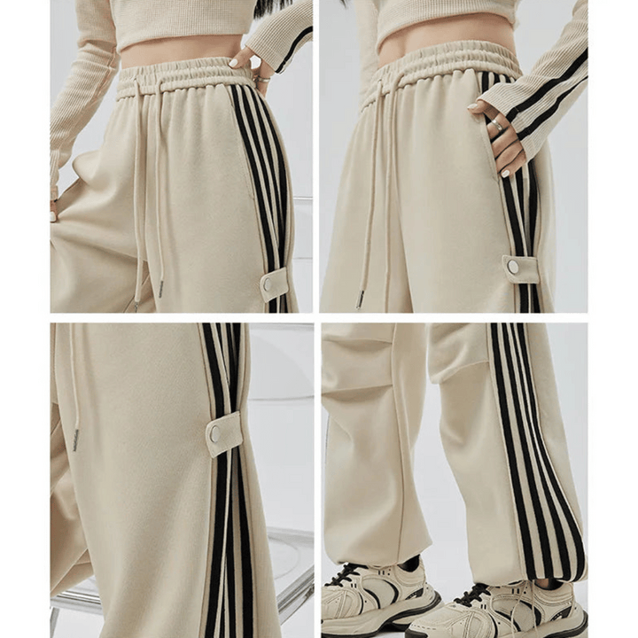 Tereza – Dámské široké teplákové kalhoty s pruhy a kapsami